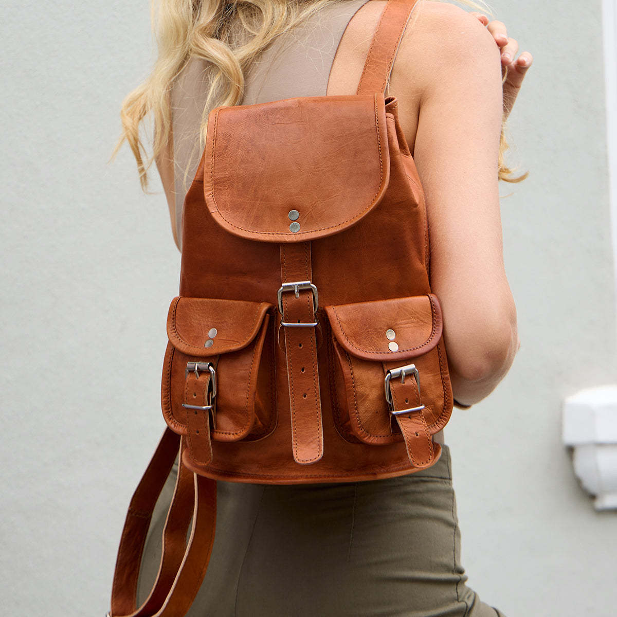 brown leather buckle backpack Gary 9.7" Leather Backpack at Gusti Leather